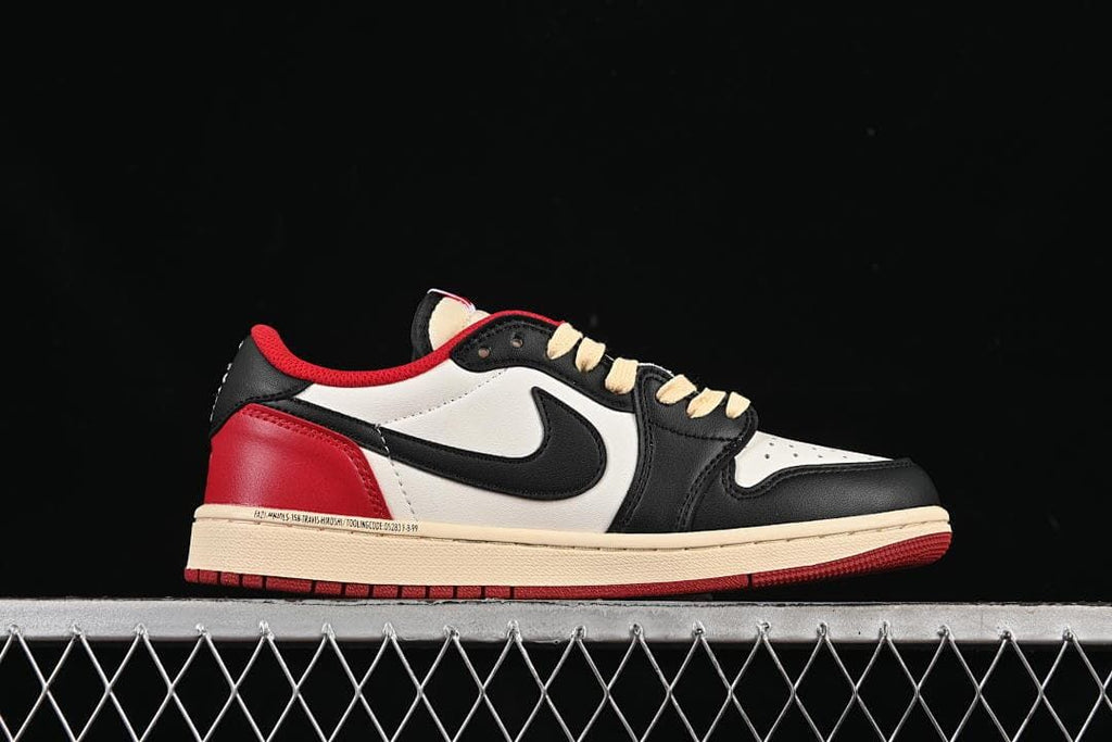 Side view highlighting the black Swoosh, white panels, red heel, and cream-colored midsole