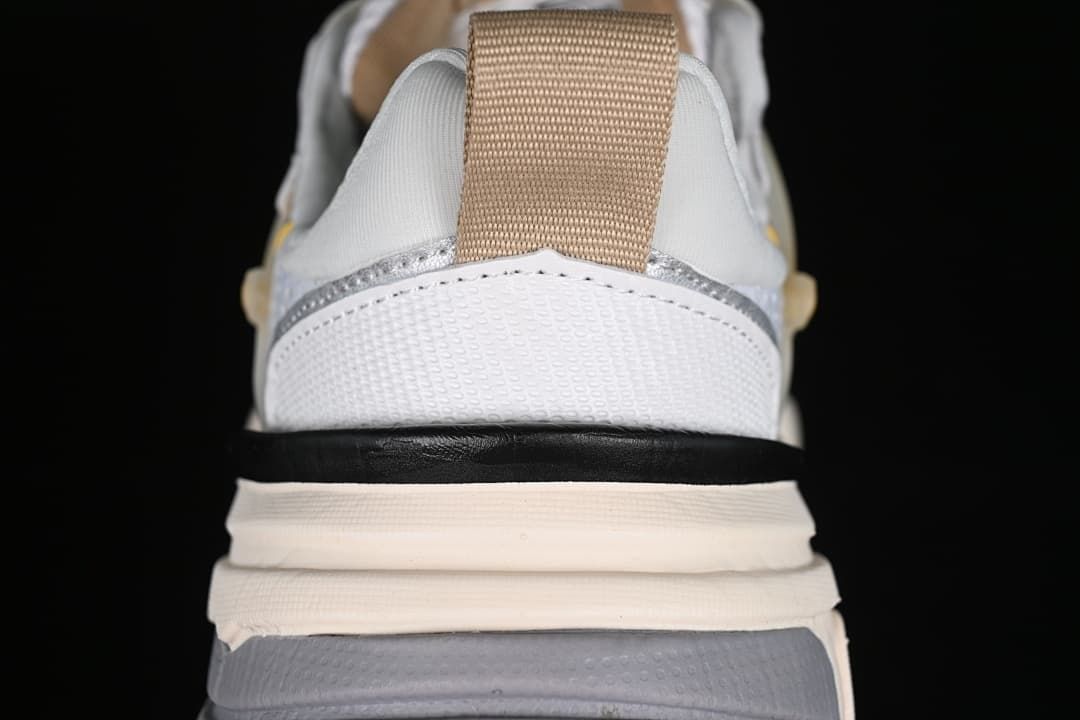 Rear view of the sneaker showing the heel pull tab and layered sole.