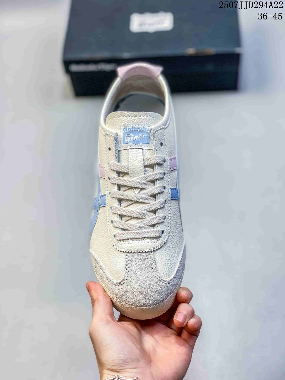Top view of the cream lace-up sneaker with a blue tongue label and pastel accents