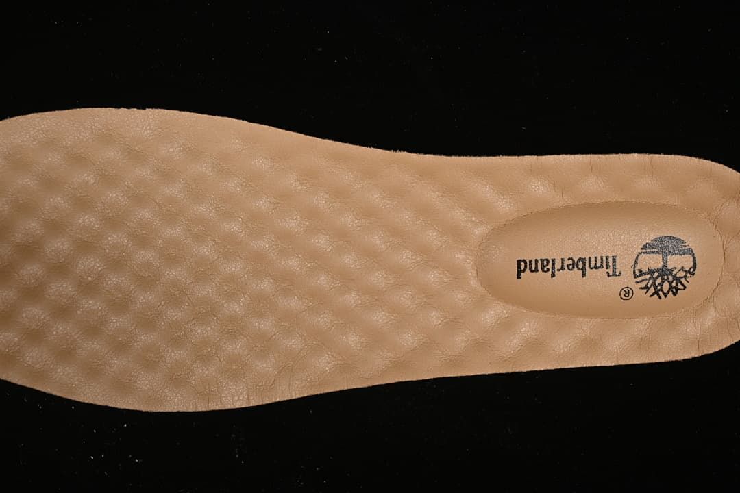 Close-up of the light-colored insole with Timberland branding