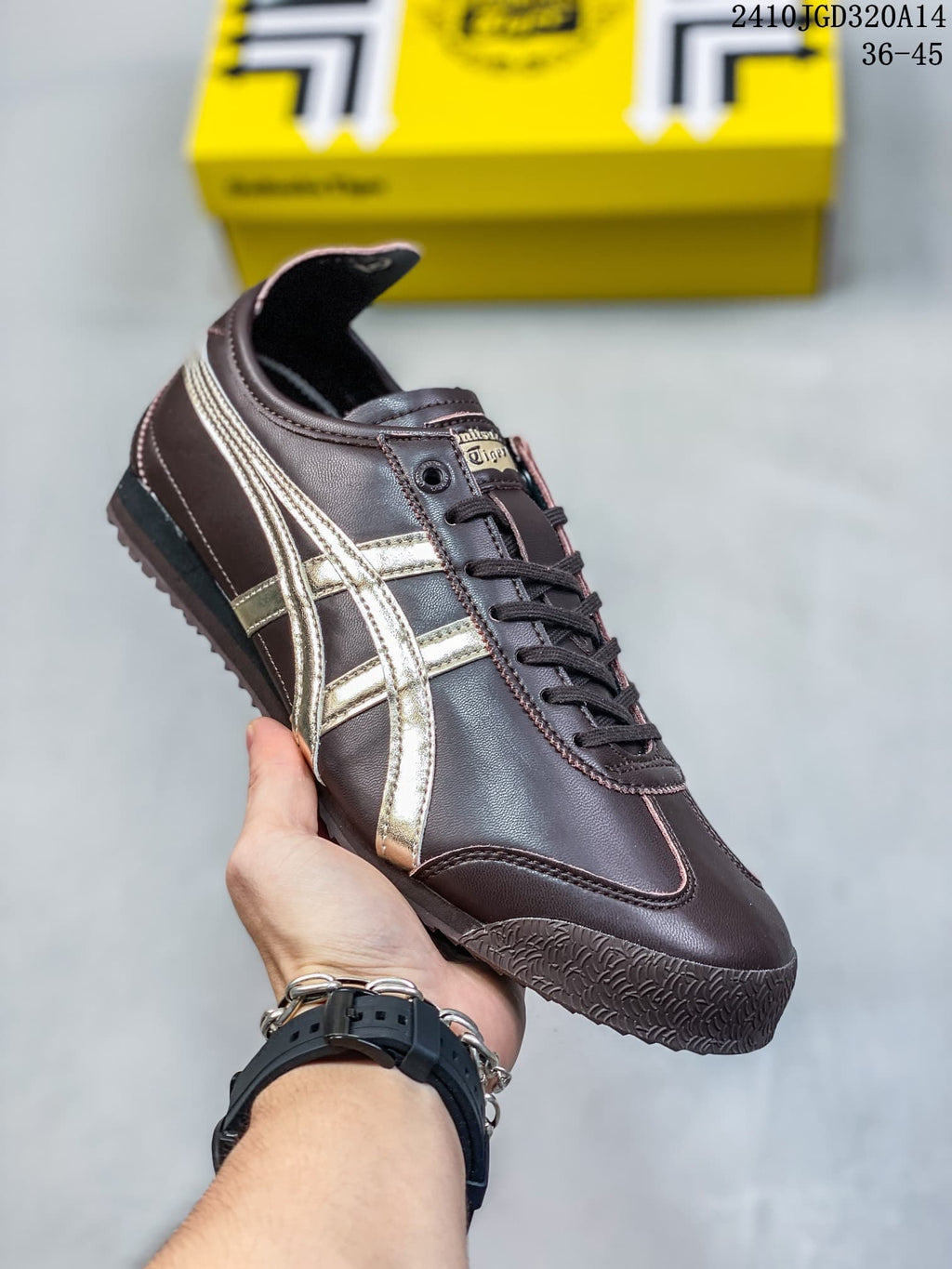 Dark brown low-top sneaker with metallic gold side stripes