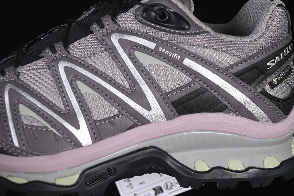 Close-up of the grey side panels, overlays, and lacing system
