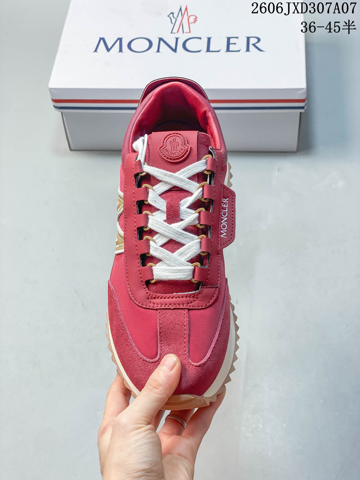 Top view of a rose-pink lace-up sneaker with white laces and gold-tone eyelets.