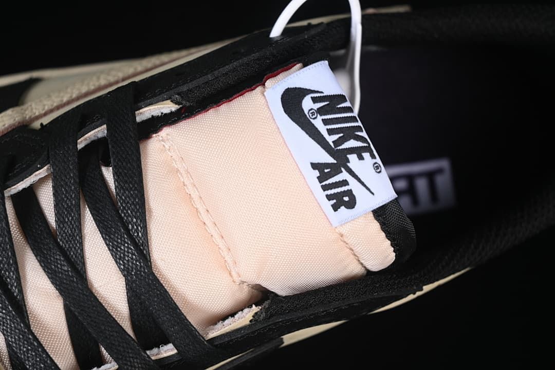Close-up of the tongue label and black laces