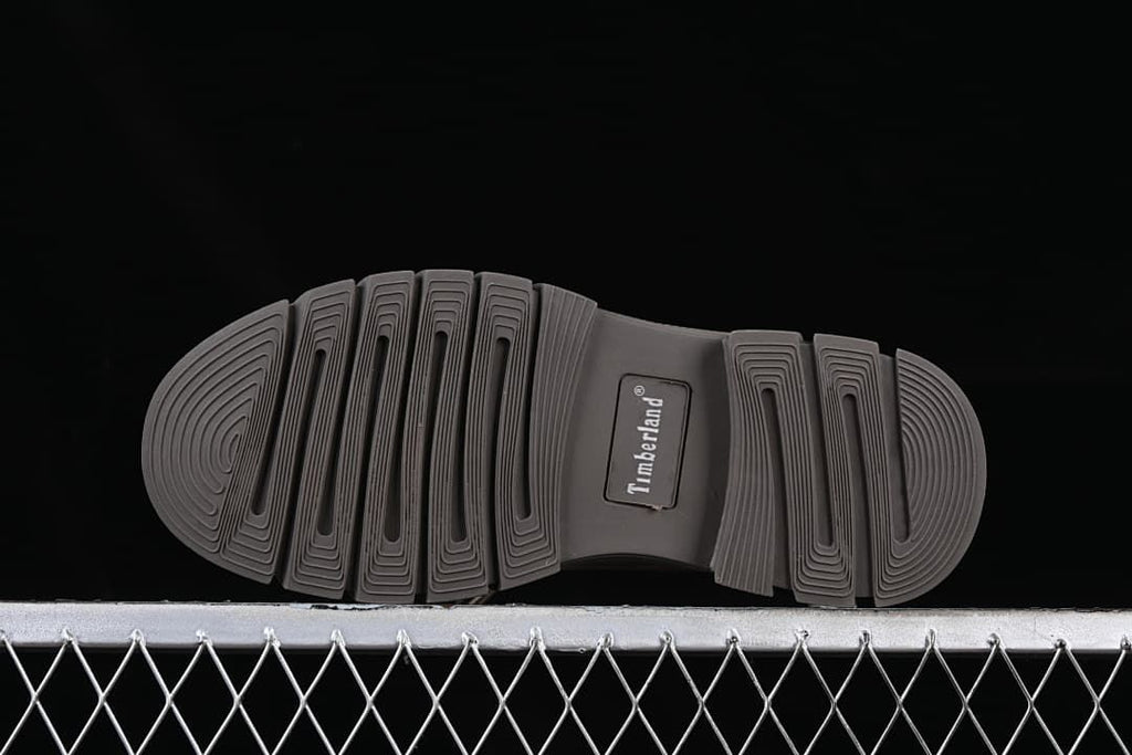 Underside view of the outsole with segmented tread