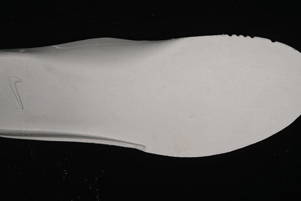 Close-up of the light-colored outsole