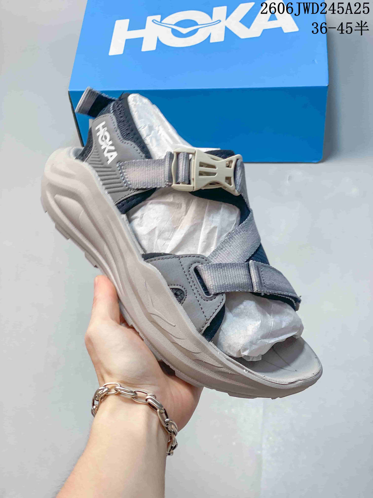 Gray HOKA Infini Hike TC sandal with a light-colored sole