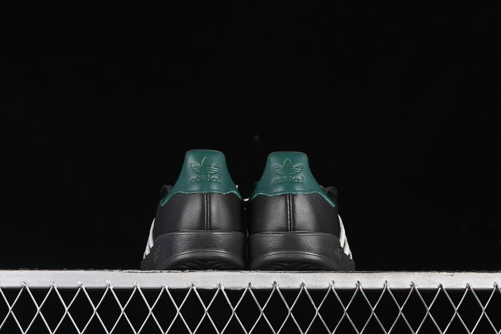 Rear view of the pair showing teal-green heel accents
