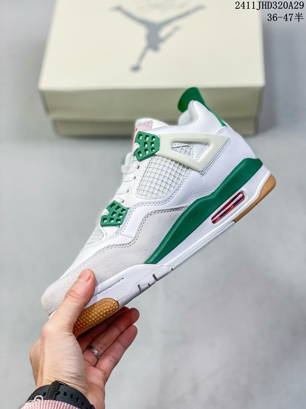 Side view showing the white upper, green accents and grey overlay
