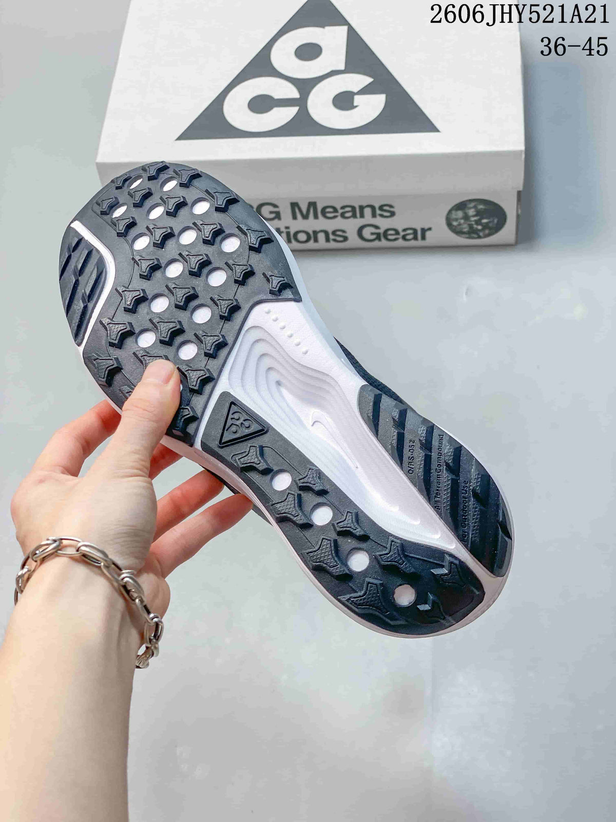 Close-up of the dark patterned outsole on a Nike ACG Etcon 10 shoe