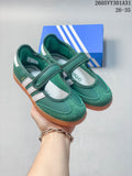 Pair of green and white adidas Samba Jane kids' shoes with hook-and-loop straps and gum-colored soles