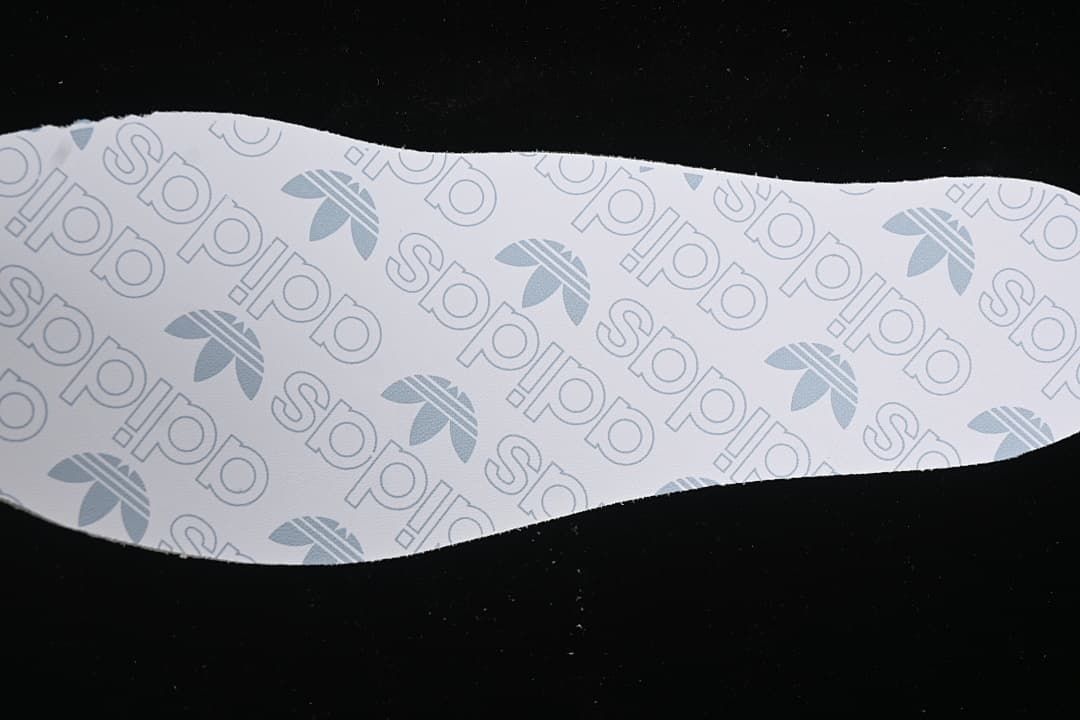 White adidas-branded insole shown separately