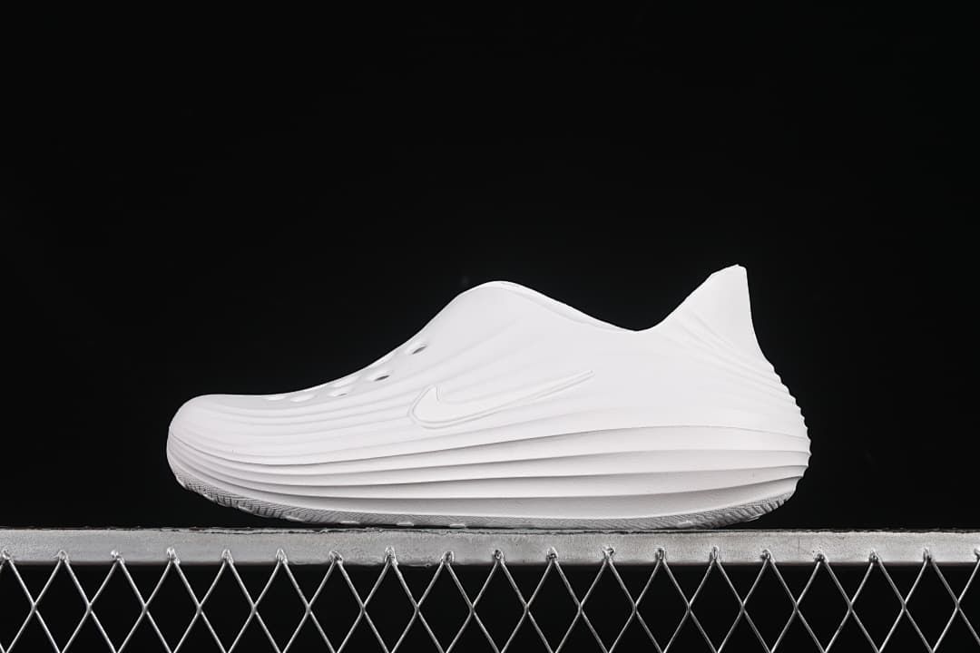 White Nike ReactX Rejuven8 clog shown in side profile