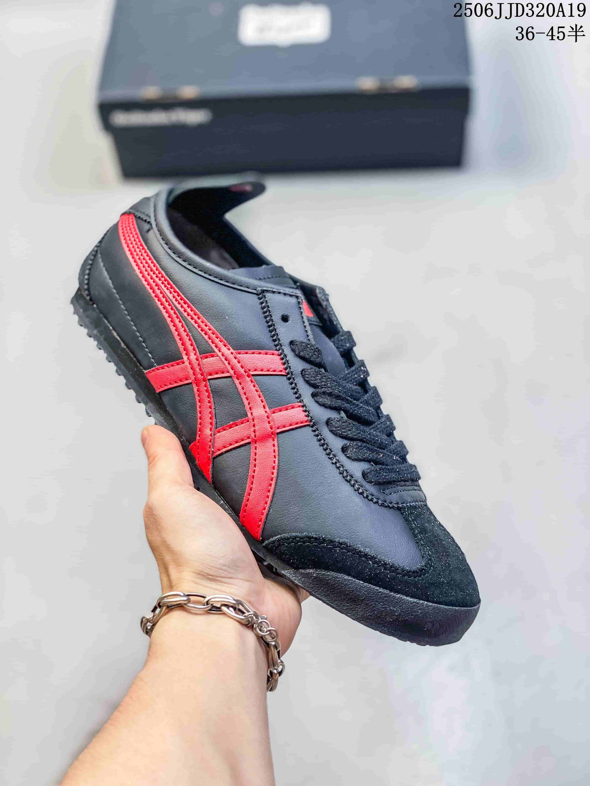 Dark gray low-top sneaker with bright red side stripes and black trim