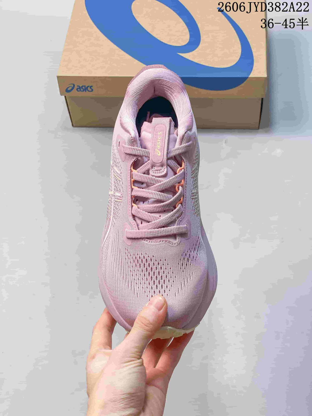Front view showing the laces and knit-look upper