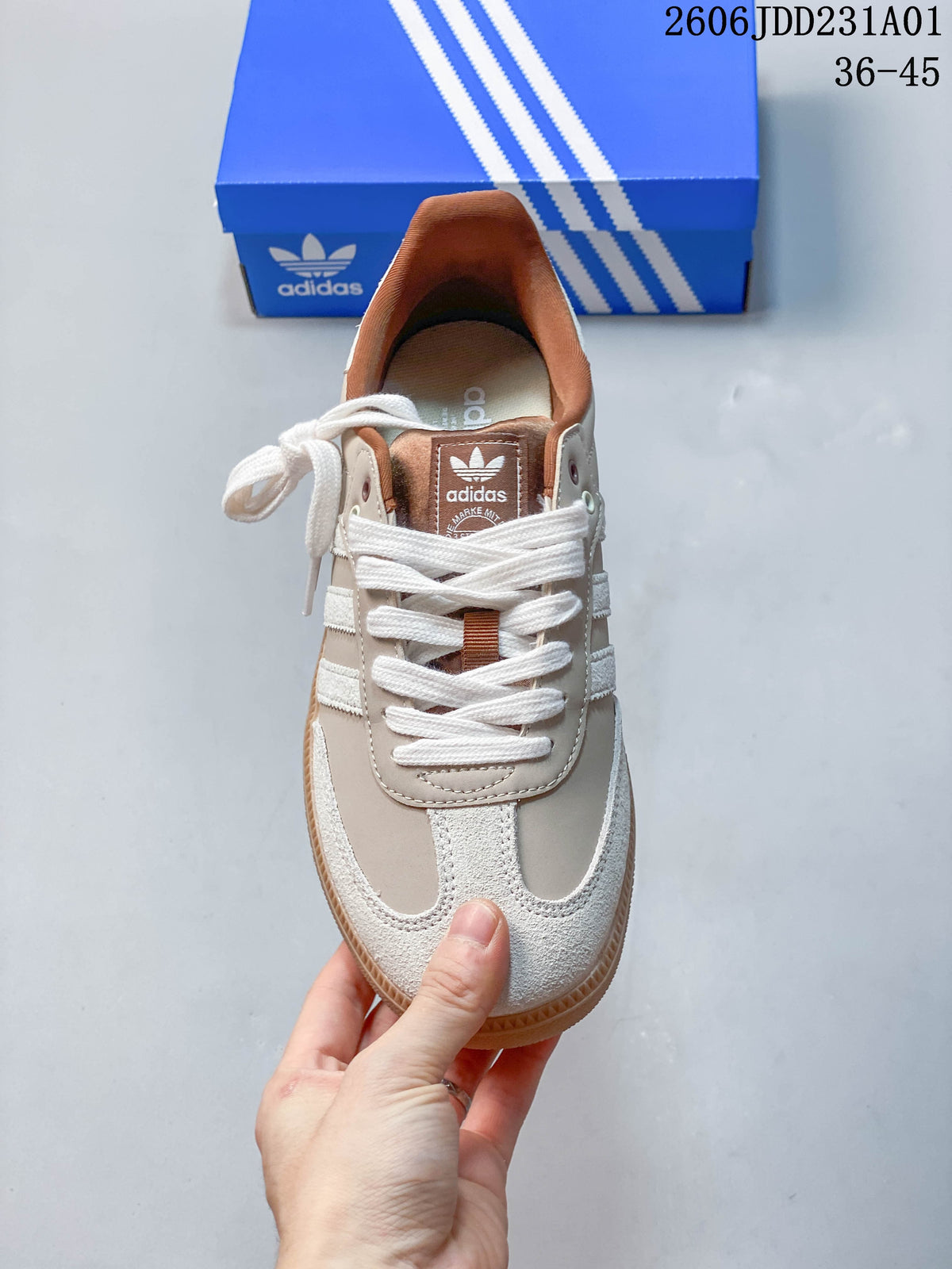 Top view of an Adidas Samba OG sneaker with white laces and brown-toned lining