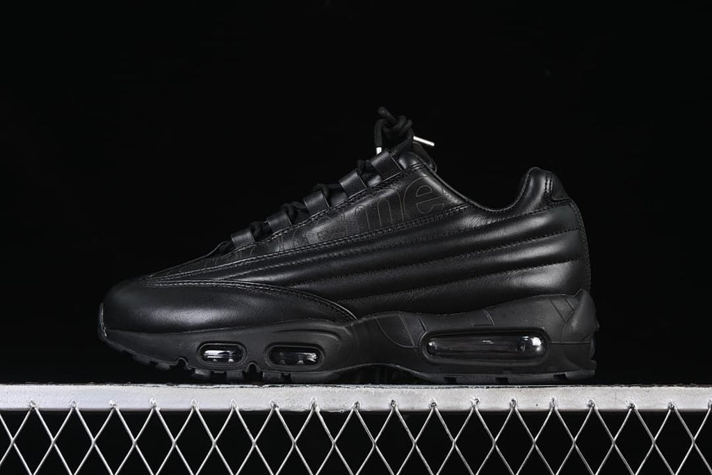 Black Nike Air Max 95 Lux sneaker shown in side profile