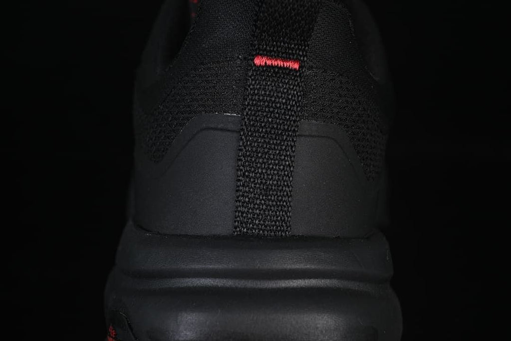 Rear view showing the heel pull loop and red accent stitch