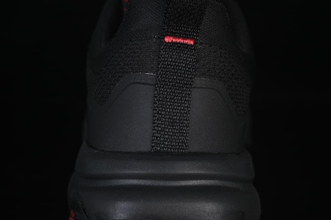 Rear view showing the heel pull loop and red accent stitch