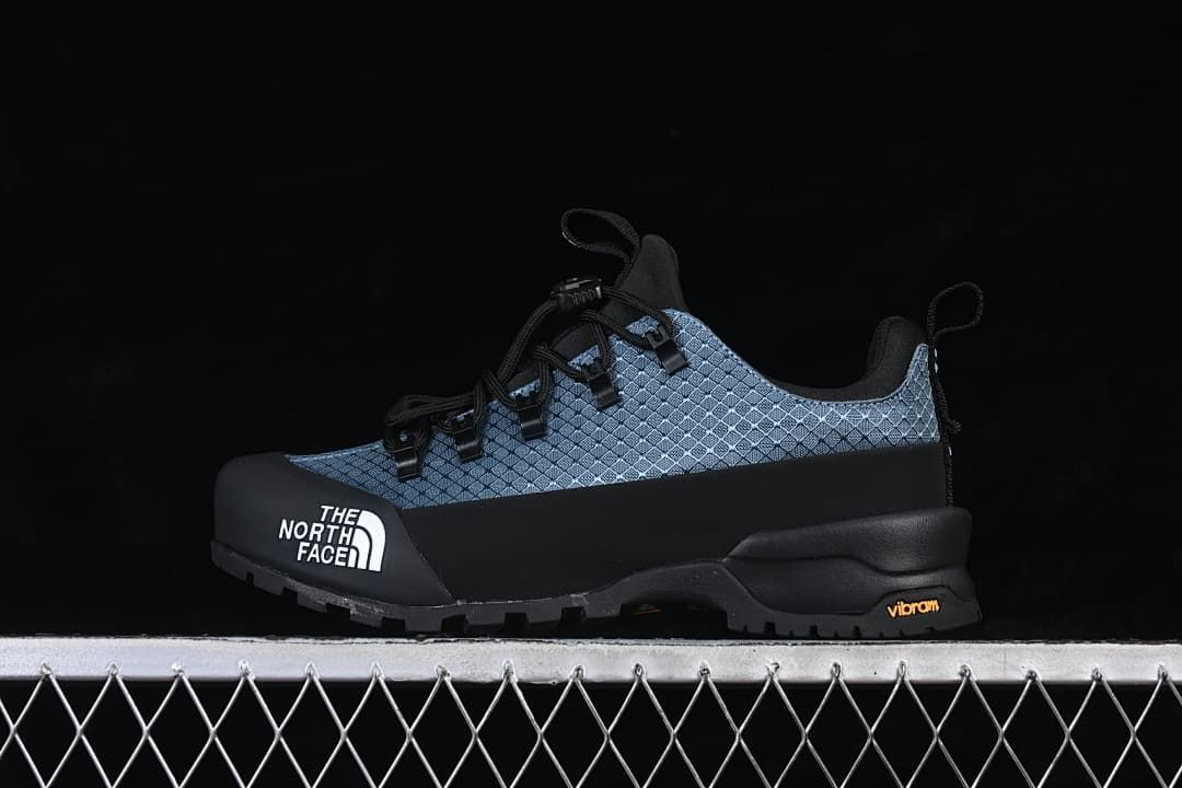Side view of the blue and black The North Face Glenclyffe Low shoe.