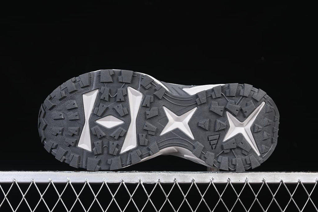 Underside view showing the patterned lug outsole.