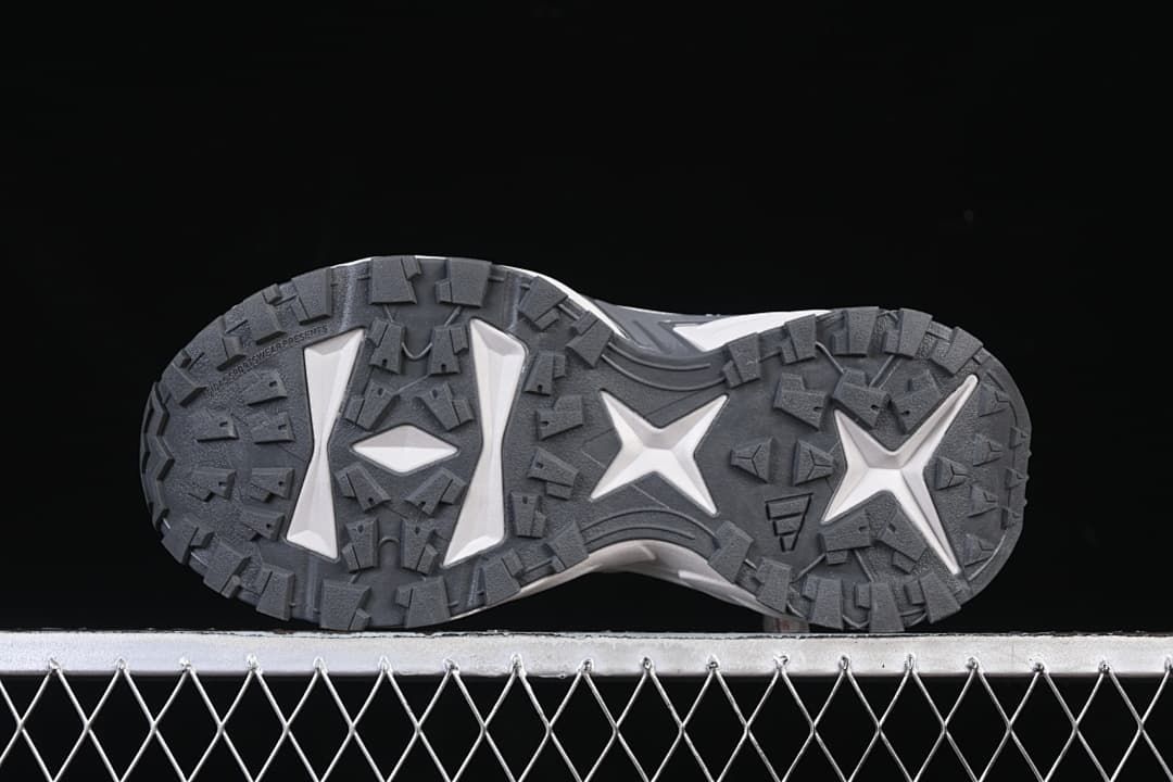Underside view showing the patterned lug outsole.