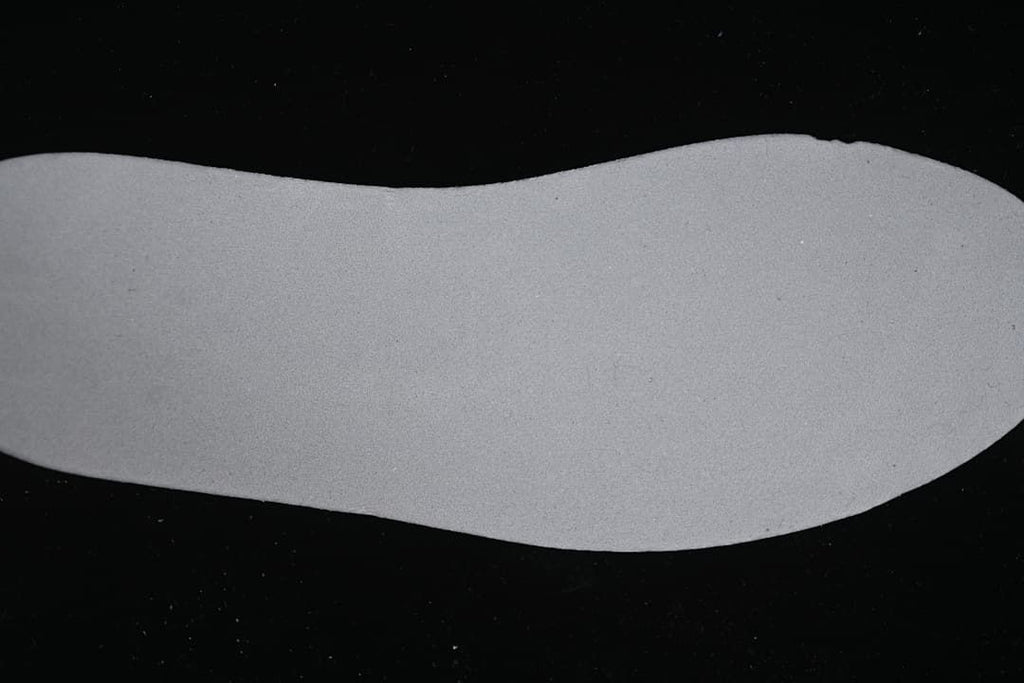 Light-colored shoe insert shown from above