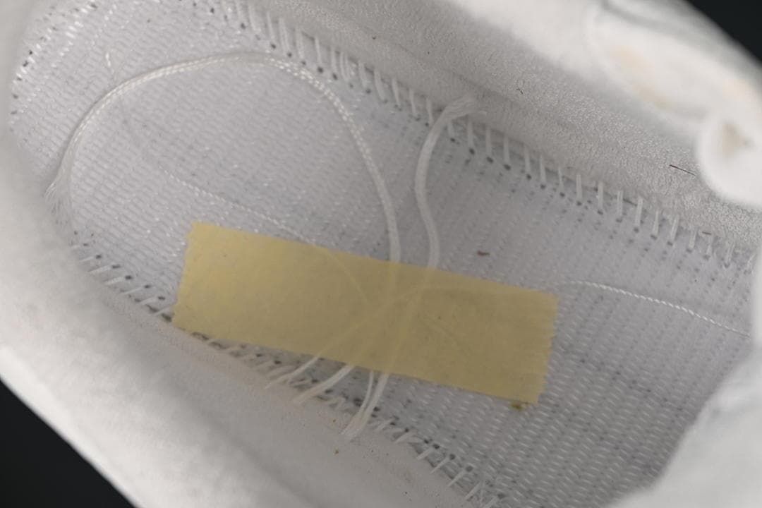 Close-up of the sneaker's interior lining and stitching