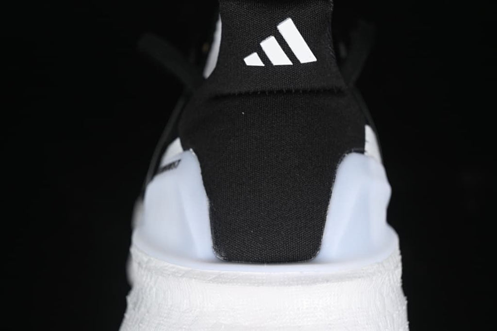 Rear view of the shoe with a black heel tab and white midsole