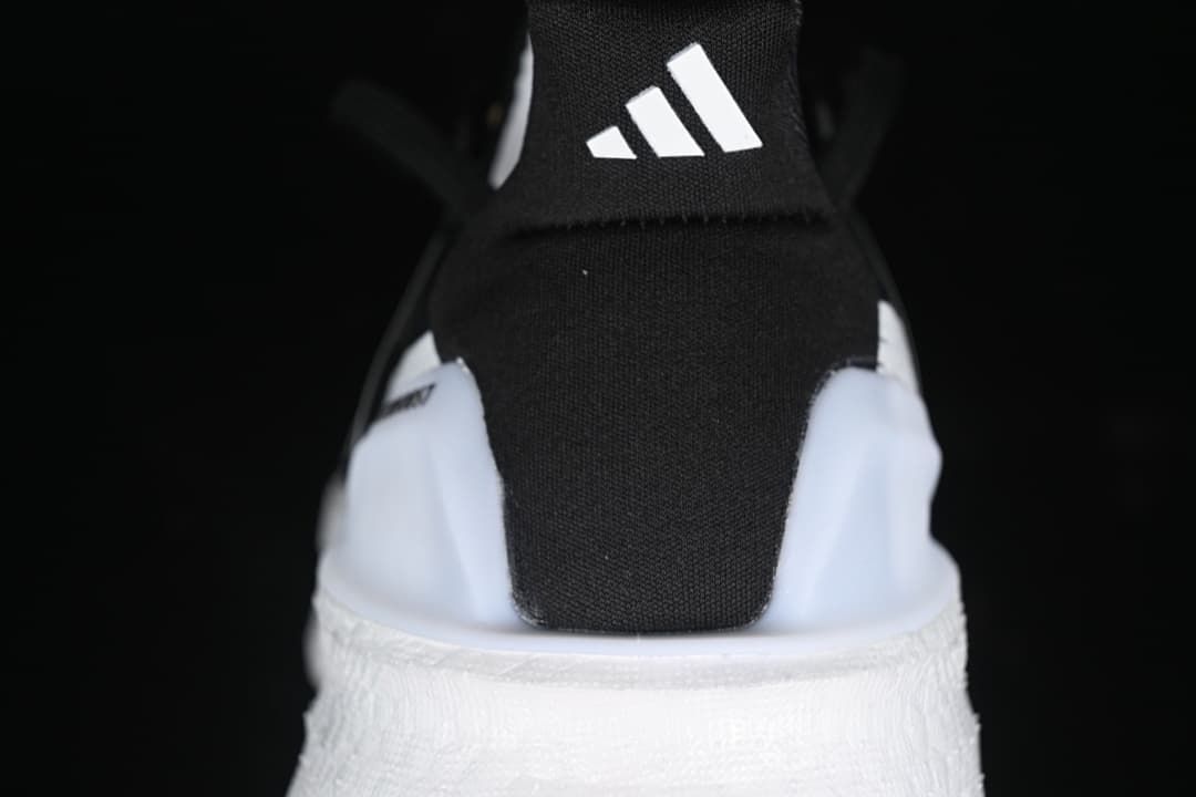 Rear view of the shoe with a black heel tab and white midsole
