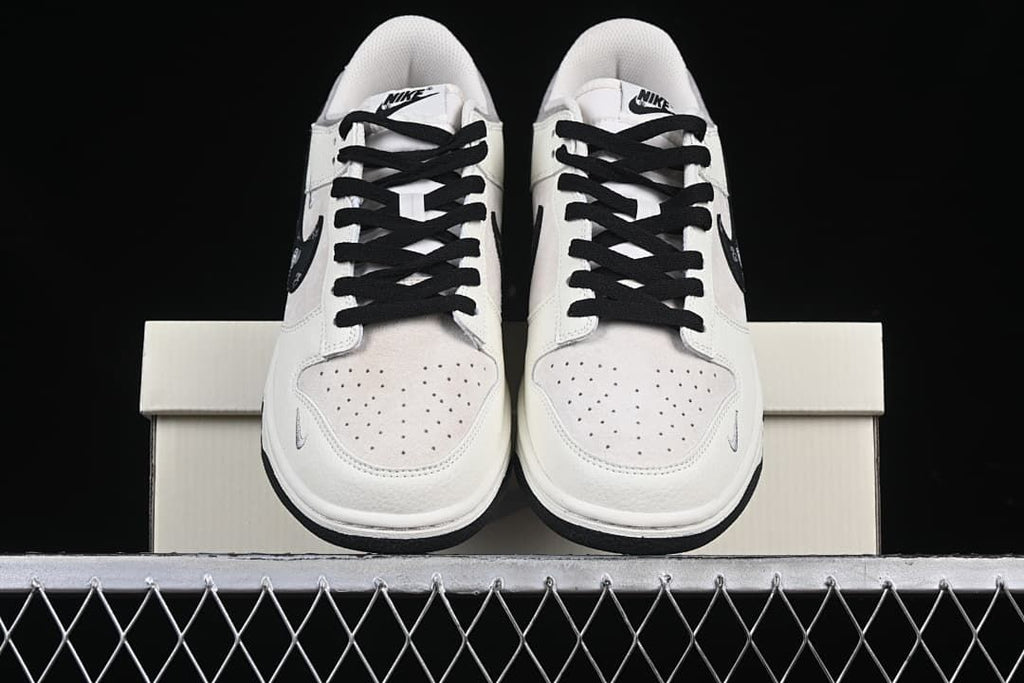 Front view of the pair showing perforated toe boxes and black laces