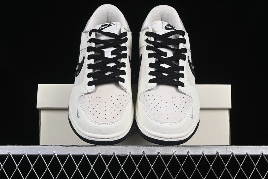 Front view of the pair showing perforated toe boxes and black laces