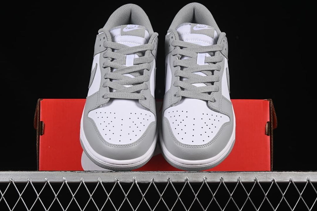 Front view of the pair showing perforated toe panels and grey laces