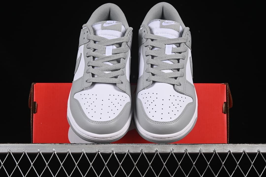 Front view of the pair showing perforated toe panels and grey laces