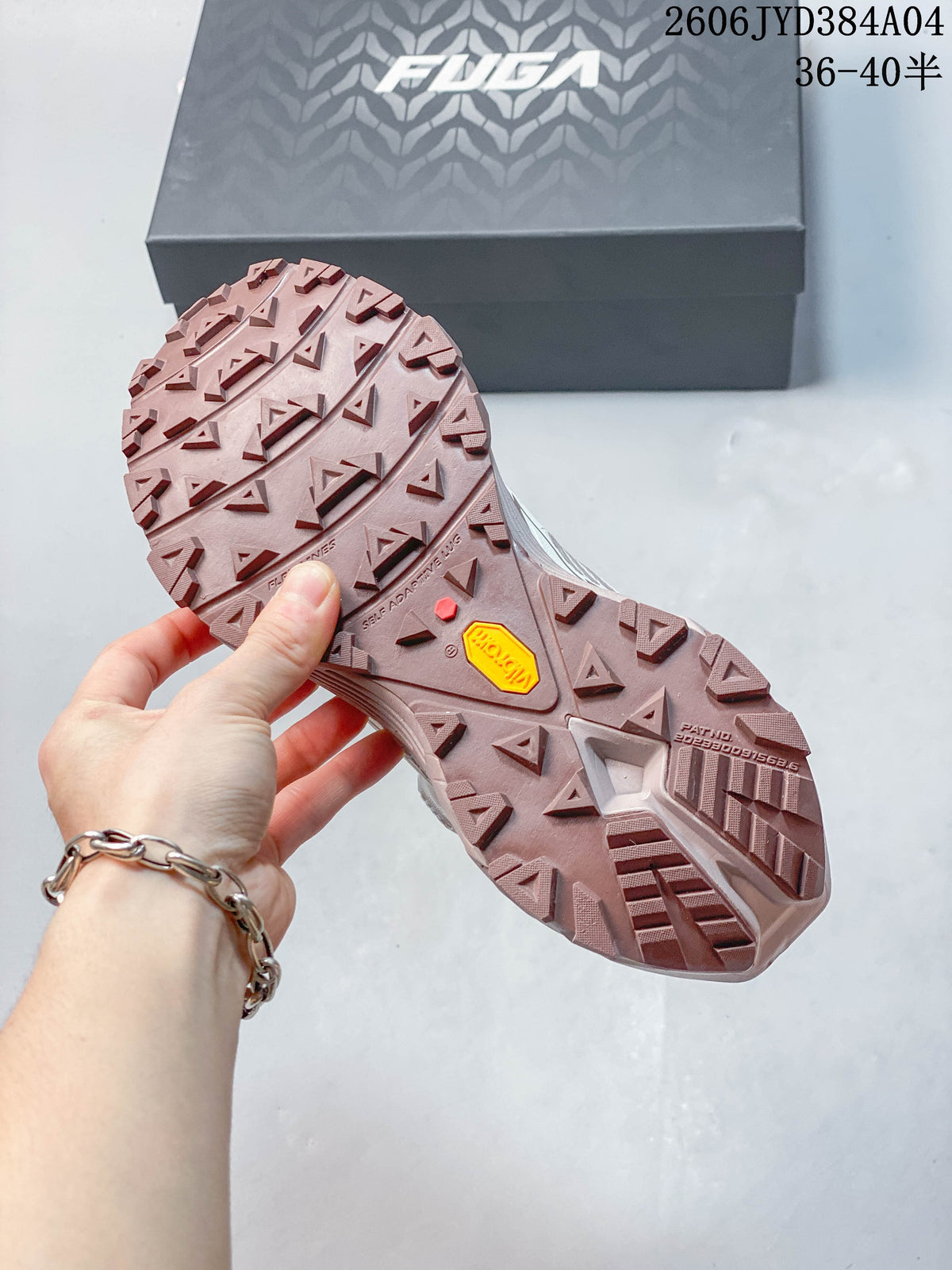 Close-up of the lugged outsole with Vibram branding on a Kailas FUGA EX3 BOA shoe