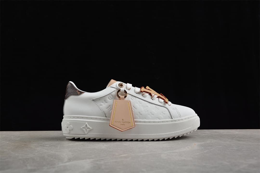 Side view highlighting the embossed panel, heel tab, and hanging tag