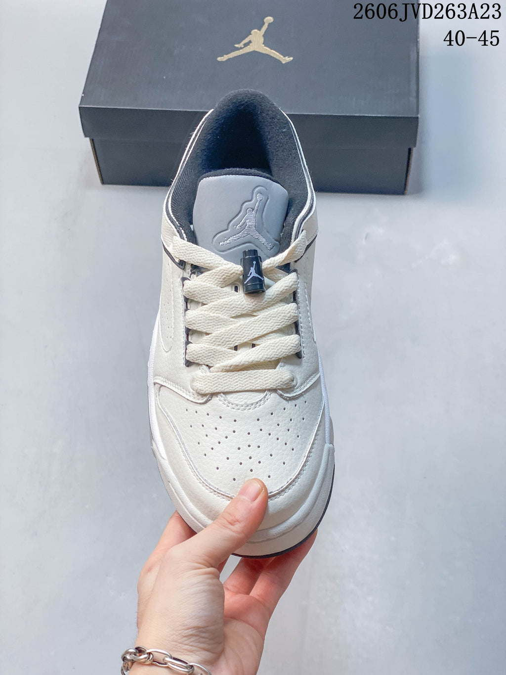 Top view showing the laces, perforated toe, and tongue of the sneaker