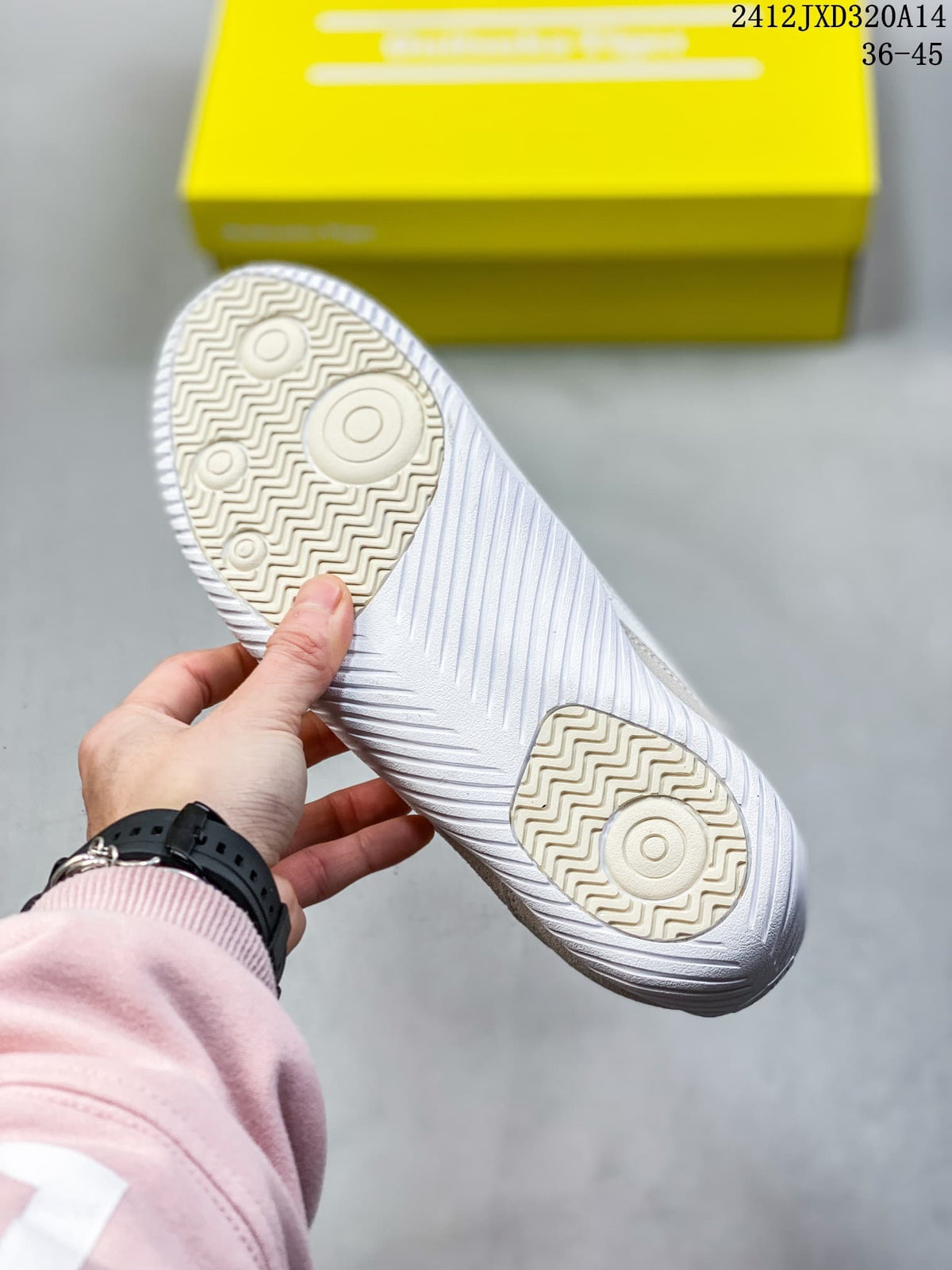 Underside of a sneaker showing its patterned tread