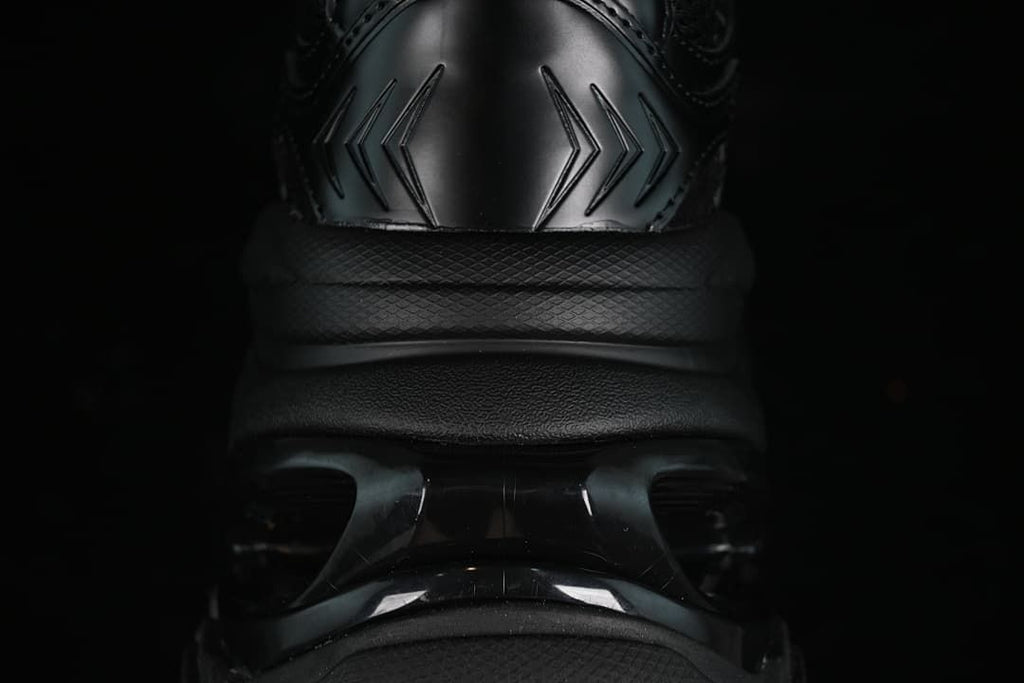Rear view highlighting the sneaker's heel panel and sculpted sole.