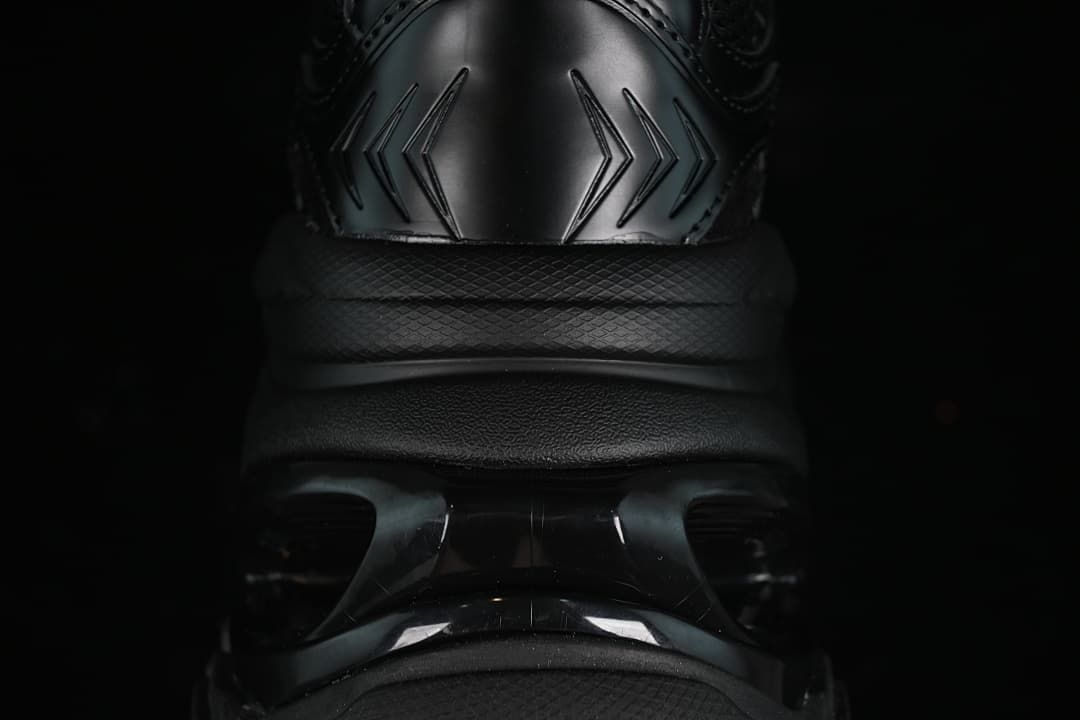 Rear view highlighting the sneaker's heel panel and sculpted sole.