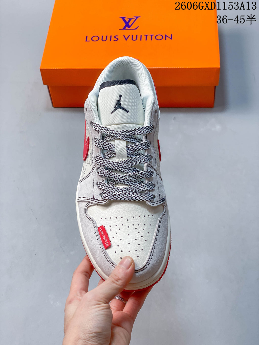 Top view showing the perforated toe, patterned laces, and light-colored upper