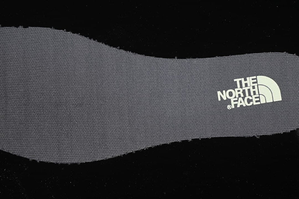 Close-up of a textured insole with The North Face logo