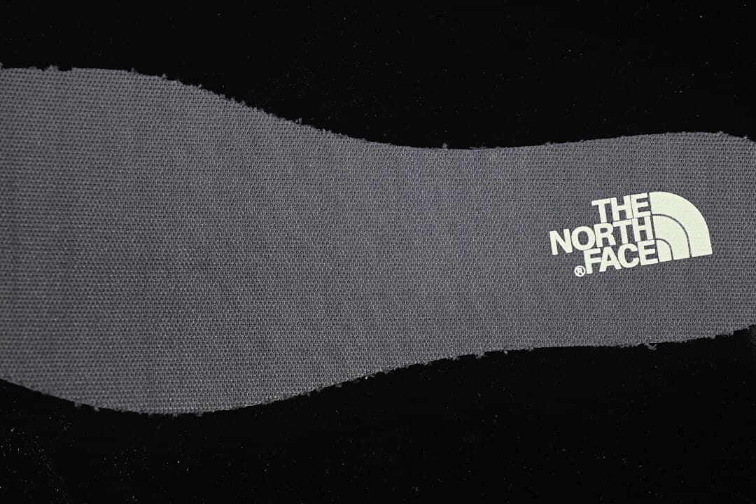 Close-up of a textured insole with The North Face logo