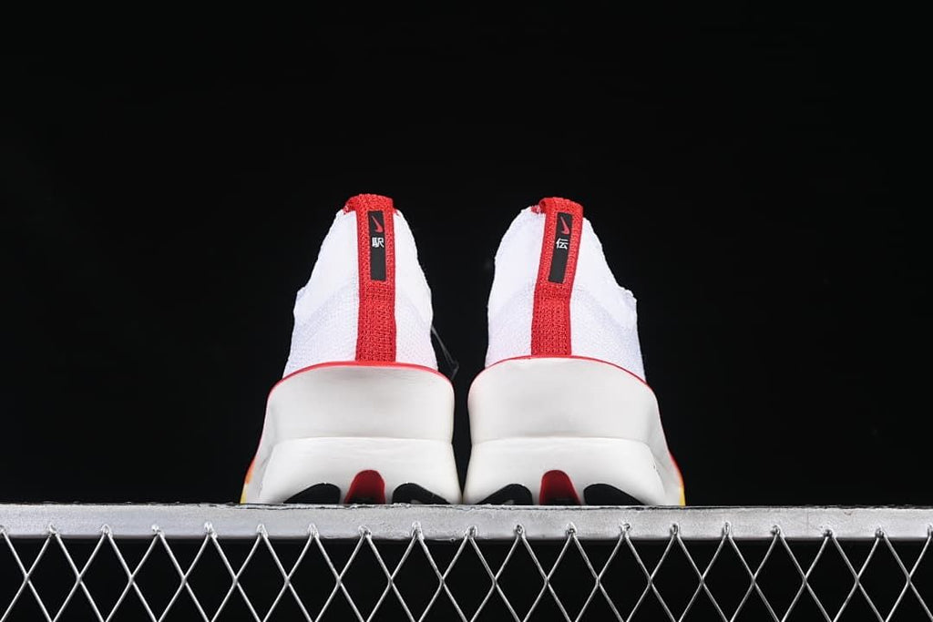 Rear view of the pair showing the heel pull tabs and midsoles
