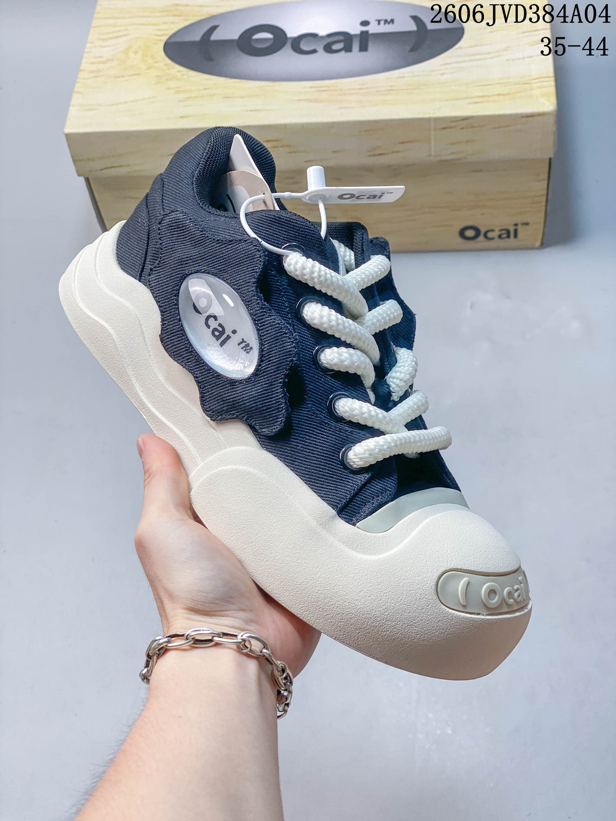 Close-up of a navy Ocai sneaker with a thick sculpted sole