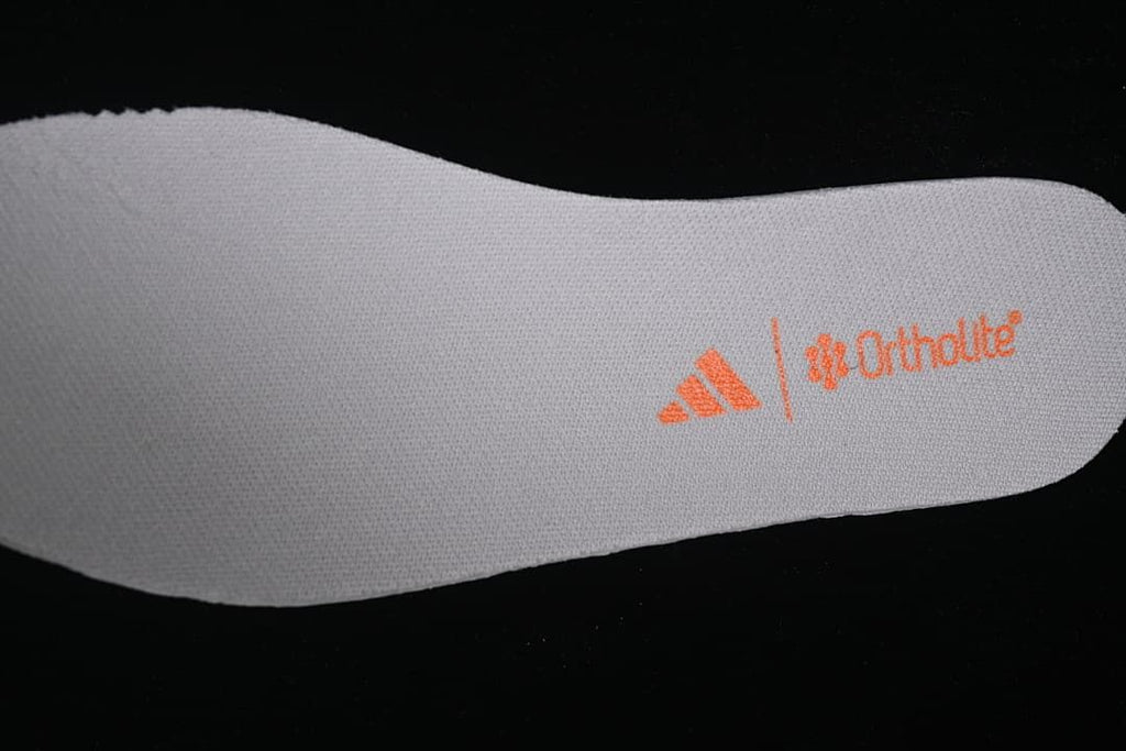 Close-up of an insole with adidas and Ortholite markings