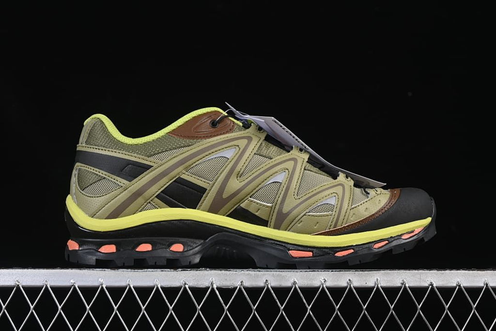 Side profile showing the layered upper and contrasting sole.