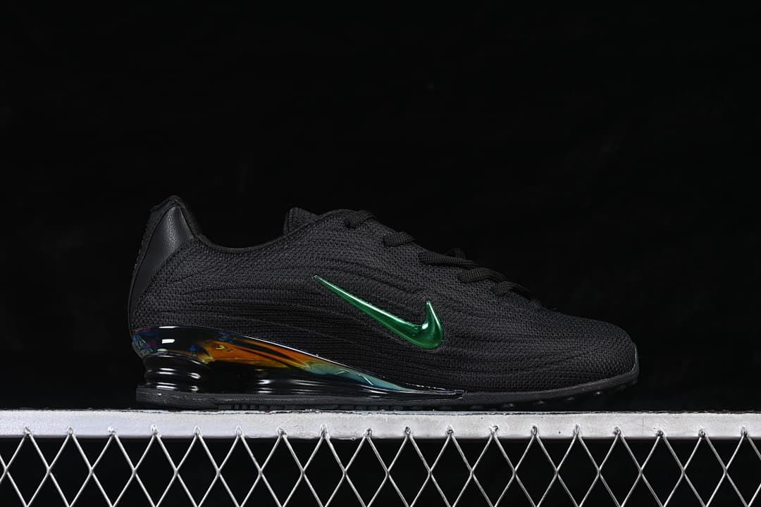 Side profile of the black sneaker with green Swoosh and iridescent heel accent.