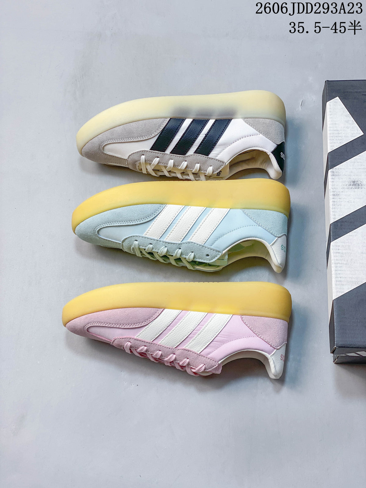 Three Adidas Barreda Decode colorways shown from the side: white and gray, pale blue, and pink.