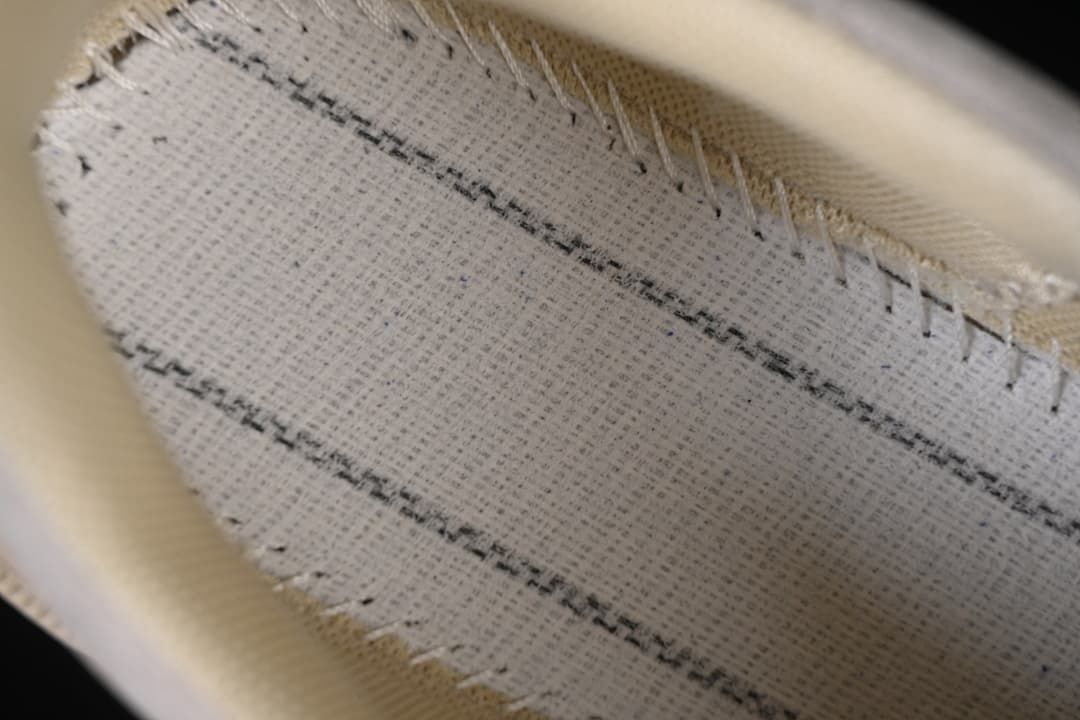 Close-up of interior shoe stitching